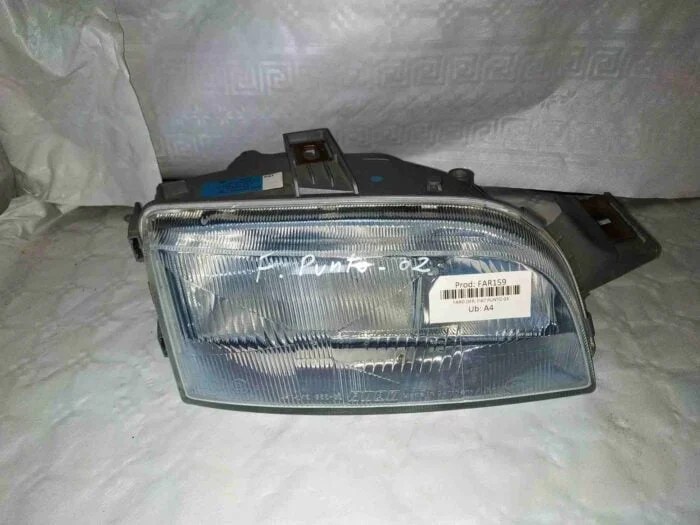 Faro delantero derecho nuevo original con bombilla Fiat Punto 2002