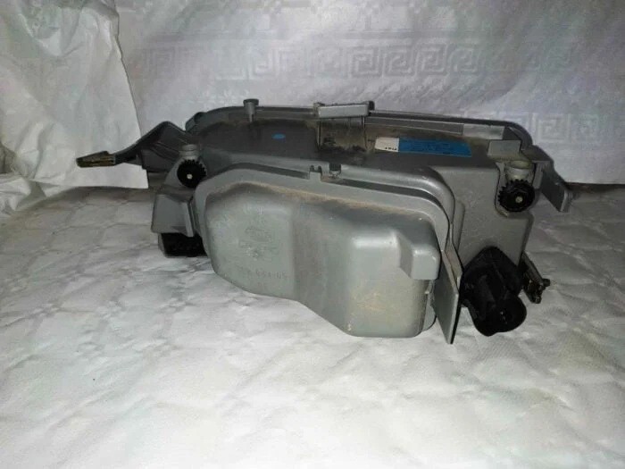 Faro delantero derecho nuevo original con bombilla Fiat Punto 2002