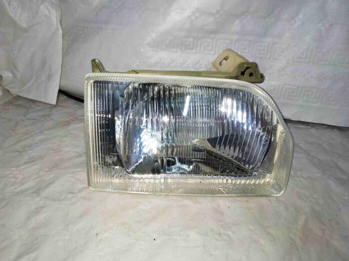 Faro delantero izquierdo Ford Escort 1990