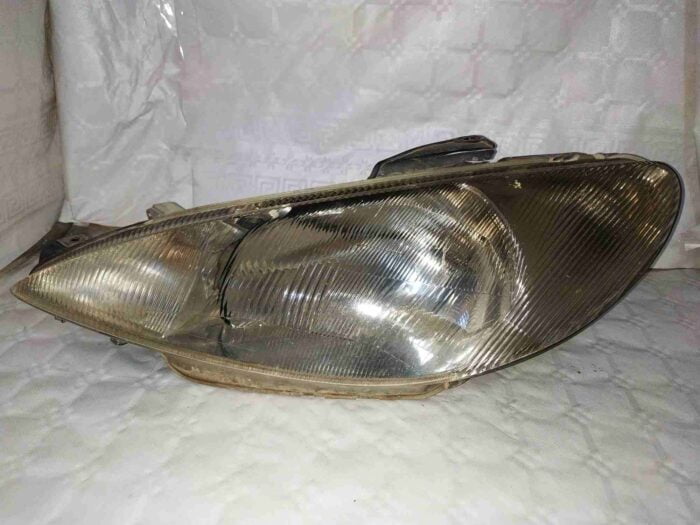 Faro delantero izquierdo Peugeot 206 2000