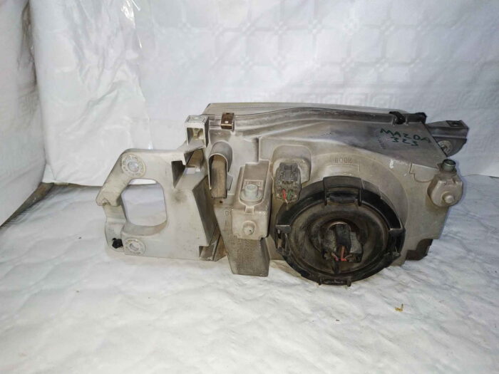 Faro delantero derecho Mazda 323 2002
