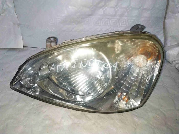 Faro delantero izquierdo Tata Indica