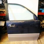 Puerta delantera derecha Kia Carnival II 2005 azul marino