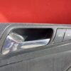 Acabamento em couro na porta dianteira esquerda VW Passat B6
