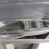 Acabamento em couro na porta dianteira esquerda VW Passat B6